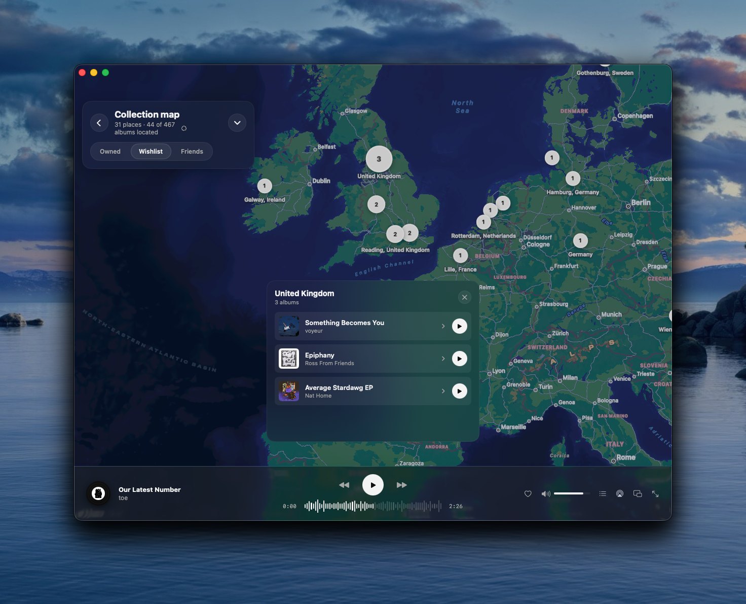 Yoin's collection map — a world map with pins for where each artist is from, and the albums from a selected country